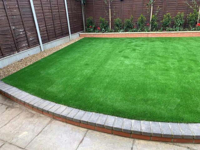 Back garden artificial grass.