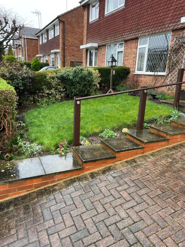 Artificial grass in front garden.
