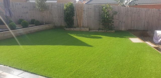 Back garden artificial grass.