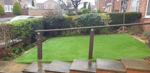 Artificial grass in front garden.