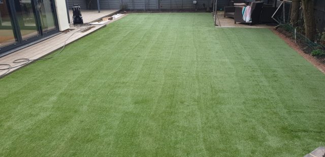 Artificial grass in garden.