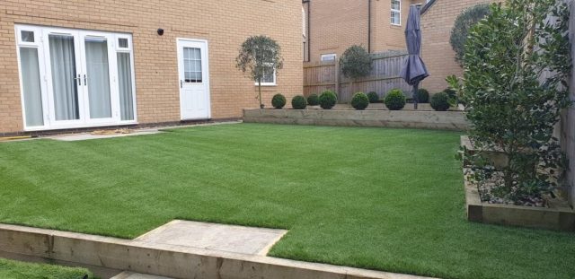 Back garden artificial grass.